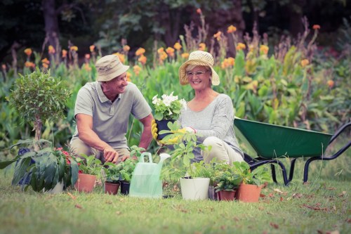 Gardener arranging tools representing Gardening Hendon